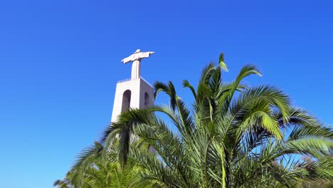 Amazing-huge-religious-Jesus-statue,-Sanctuary-of-Christ-the-King-from-Almada,-Portugal