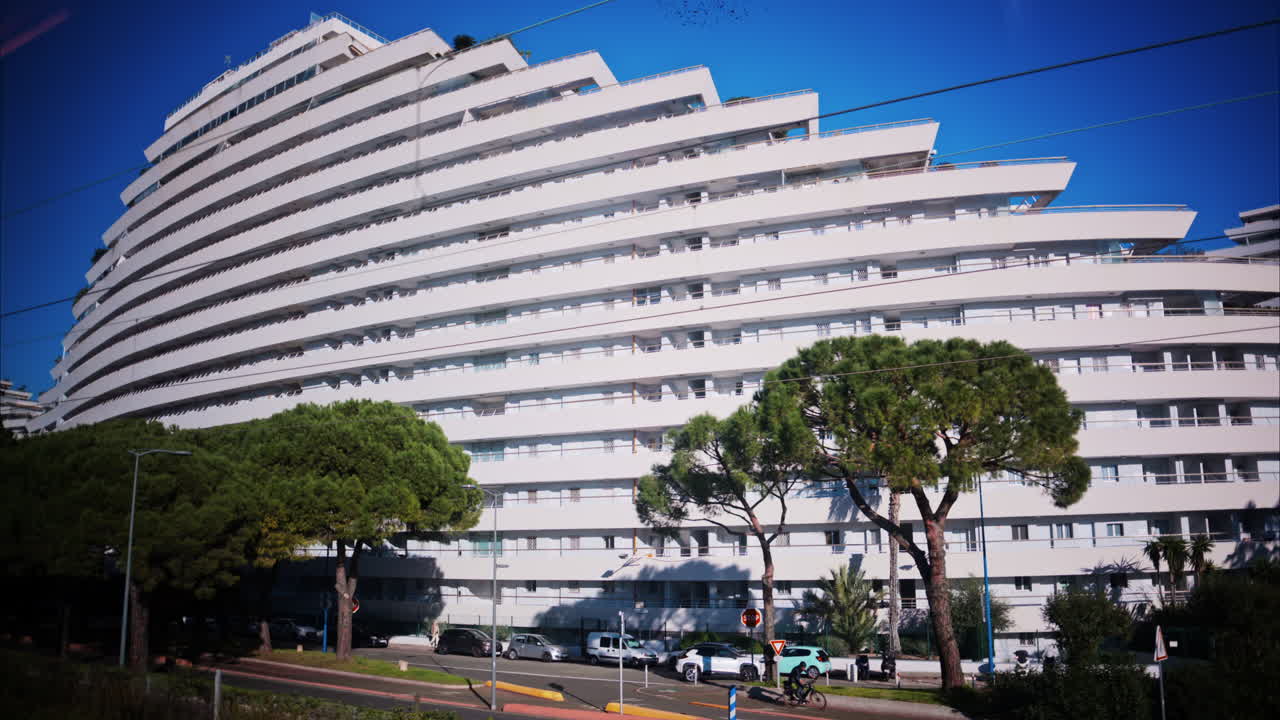 View from a moving train of the Marina Baie des Anges in Villeneuve-Loubet, France