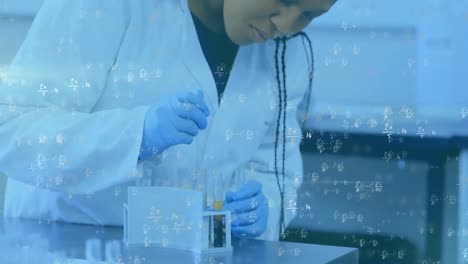 Mathematical-equations-moving-against-female-scientist-working-in-laboratory