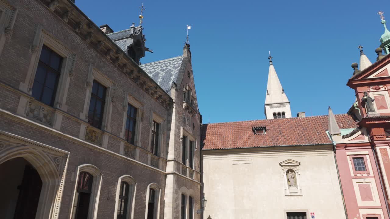 St. George's Basilica in Prague with historical architecture under clear blue skies