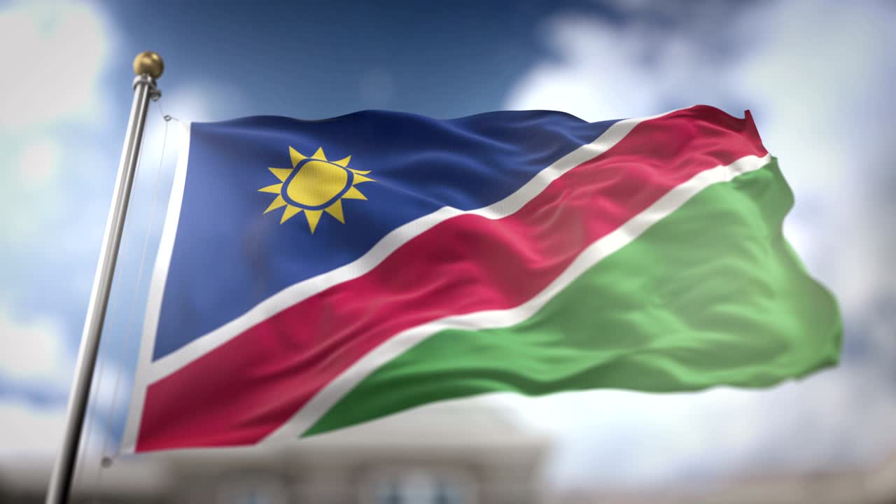 나미비아 국기가 느린 동작으로 흔들리는 3d 렌더링 파란 하늘 배경 - 원활한 루프 4k
