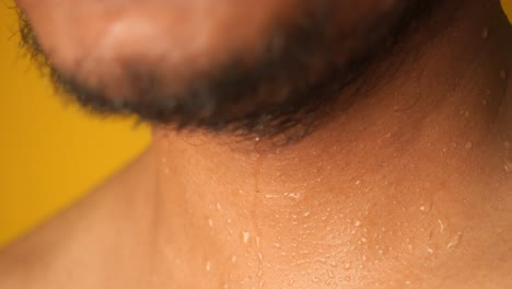 close-up of a man's sweaty neck