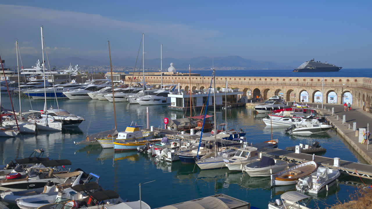Many white boats docked in the Port Vauban on a sunny day, antibes, france