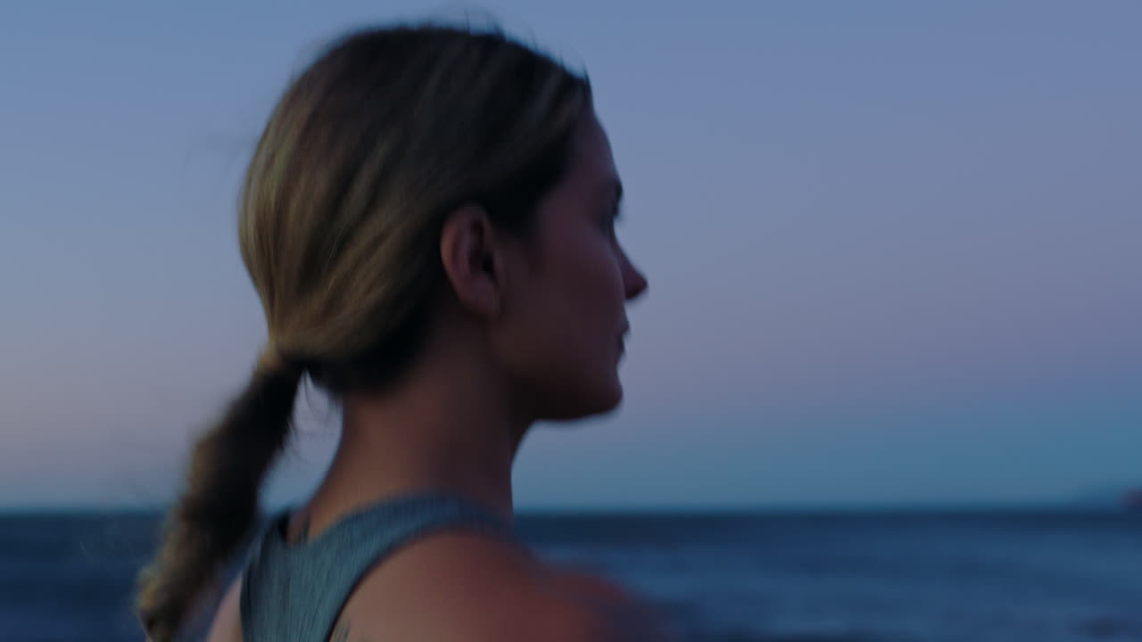Runner, fitness or woman on sunrise beach