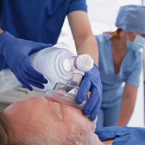 doctor wearing oxygen mask on patient