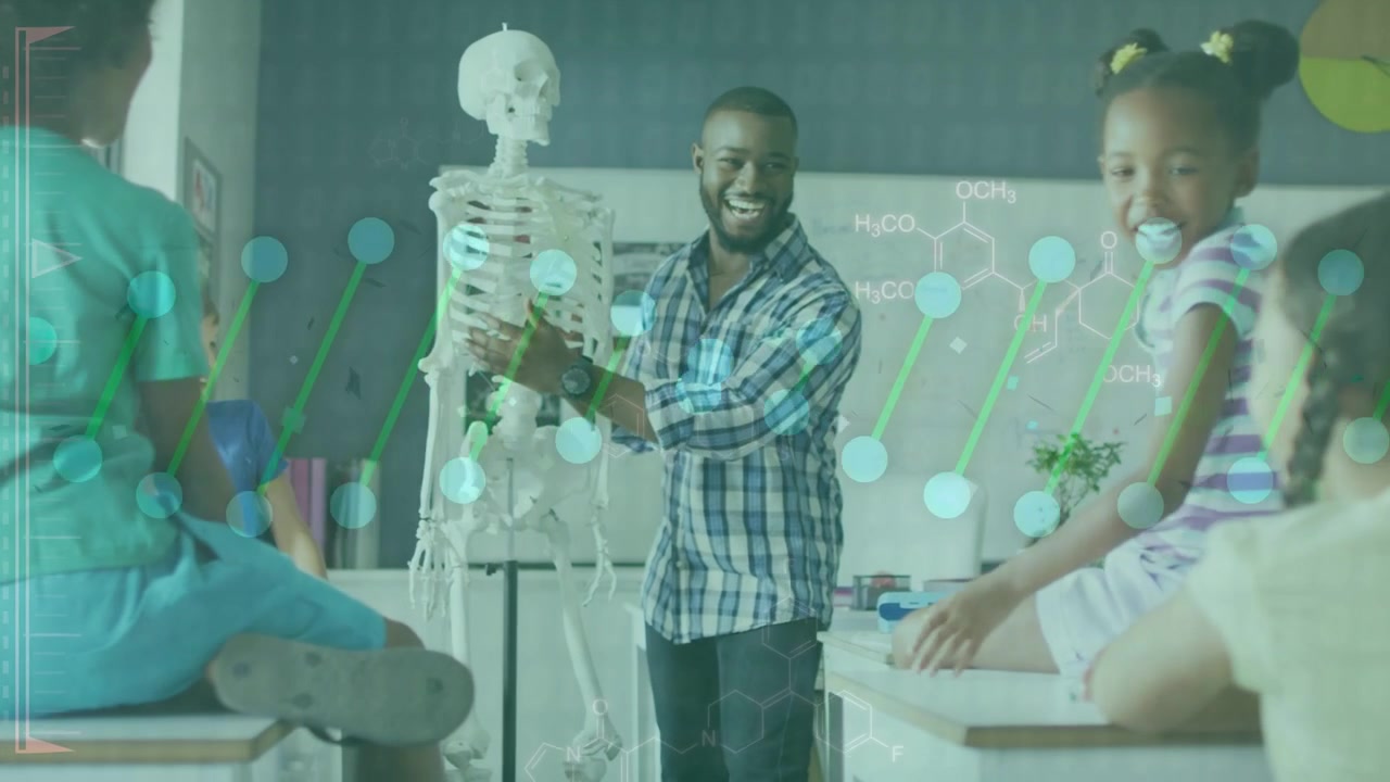 Teacher gesturing toward skeleton and activating molecular overlay while teaching anatomy to class