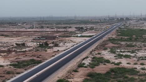 aerial shot of empty street in the rural area of pakistan