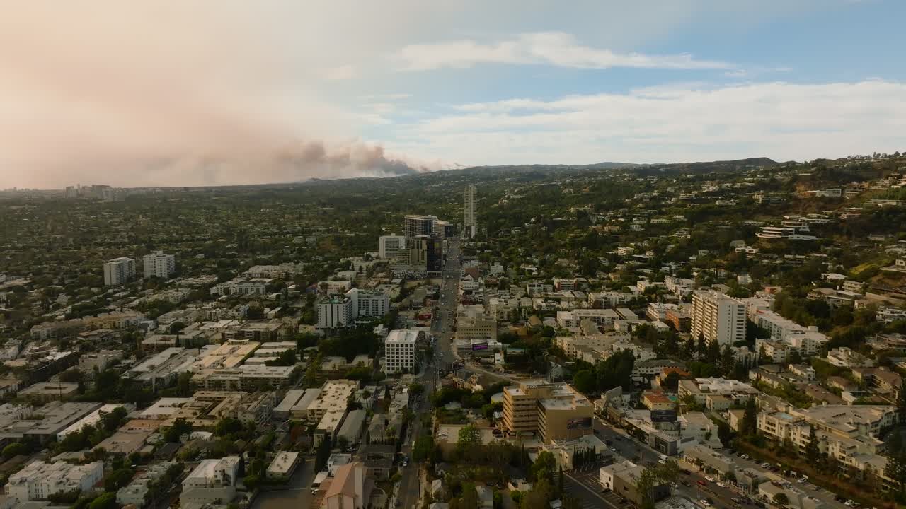 4K aerial of the LA fires in January 2025 from West Hollywood, Los Angeles, California, USA.