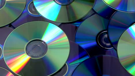 Rotating shiny DVD and CD compact discs background