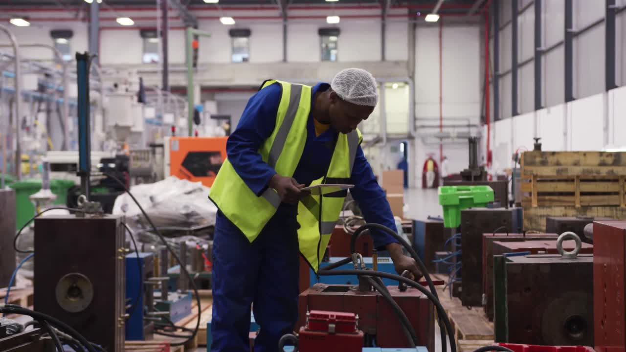 Warehouse worker using a digital tablet
