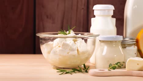 various dairy items displayed on a wooden surface