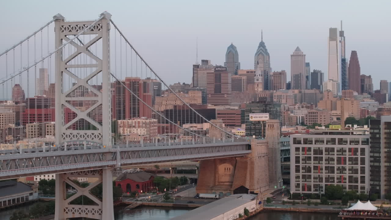 Establishing shot of Philadelphia's Ben Franklin Bridge. Shot on a summer morning