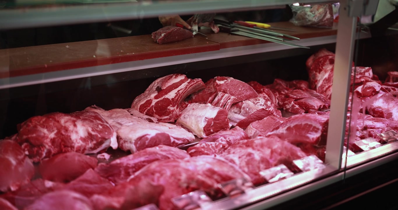 Fresh Red Meat Cuts in a Butcher Shop Display Case