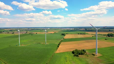 Aerial-view-of-powerful-Wind-turbine-farm-for-energy-production-on-beautiful-cloudy-sky-at-highland