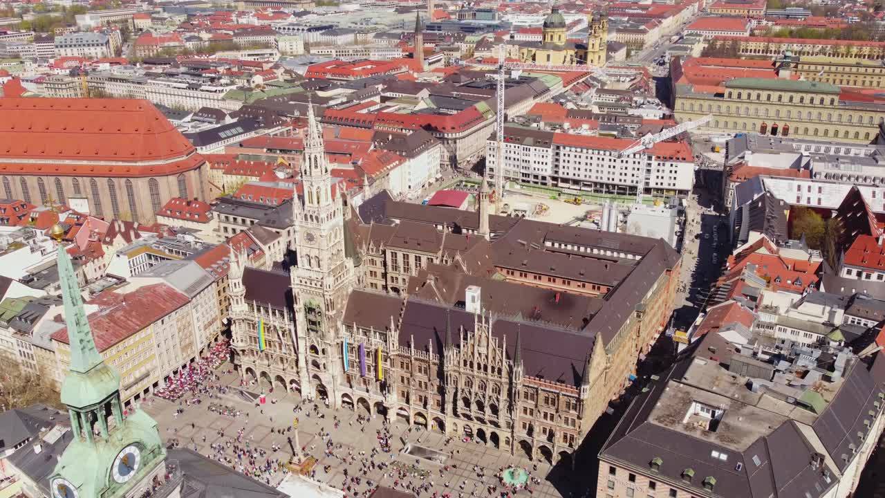 Marienplatz in munich, showing the iconic town hall and busy square, aerial view, vertical