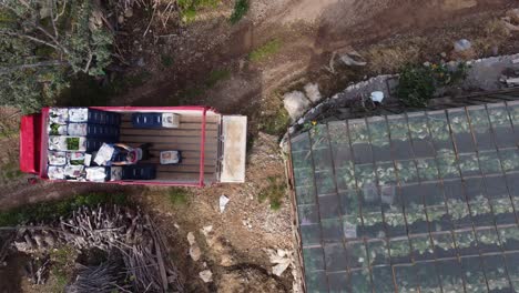 greenhouse workers load the products truck