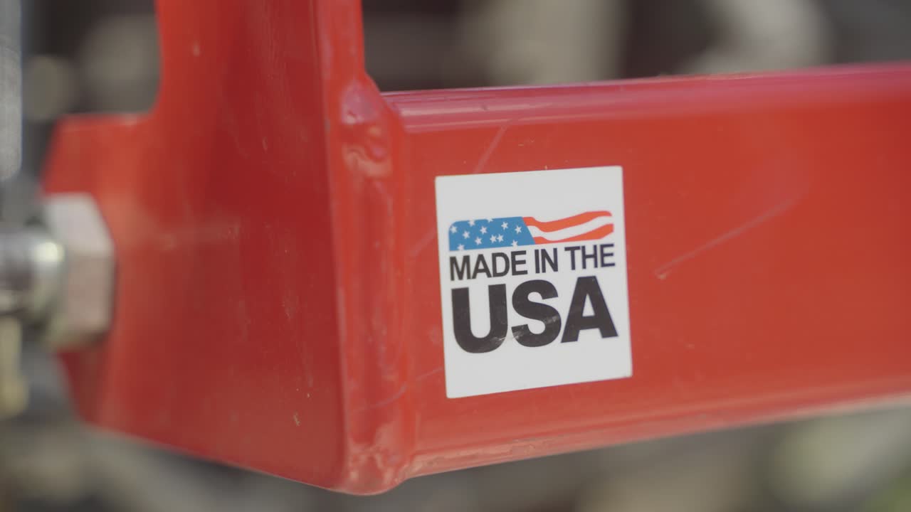Closeup shot of made in usa label pasted on machine.