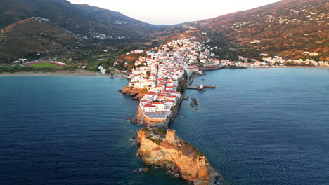 aerial view video of iconic andros island chora, cyclades, greece at dusk