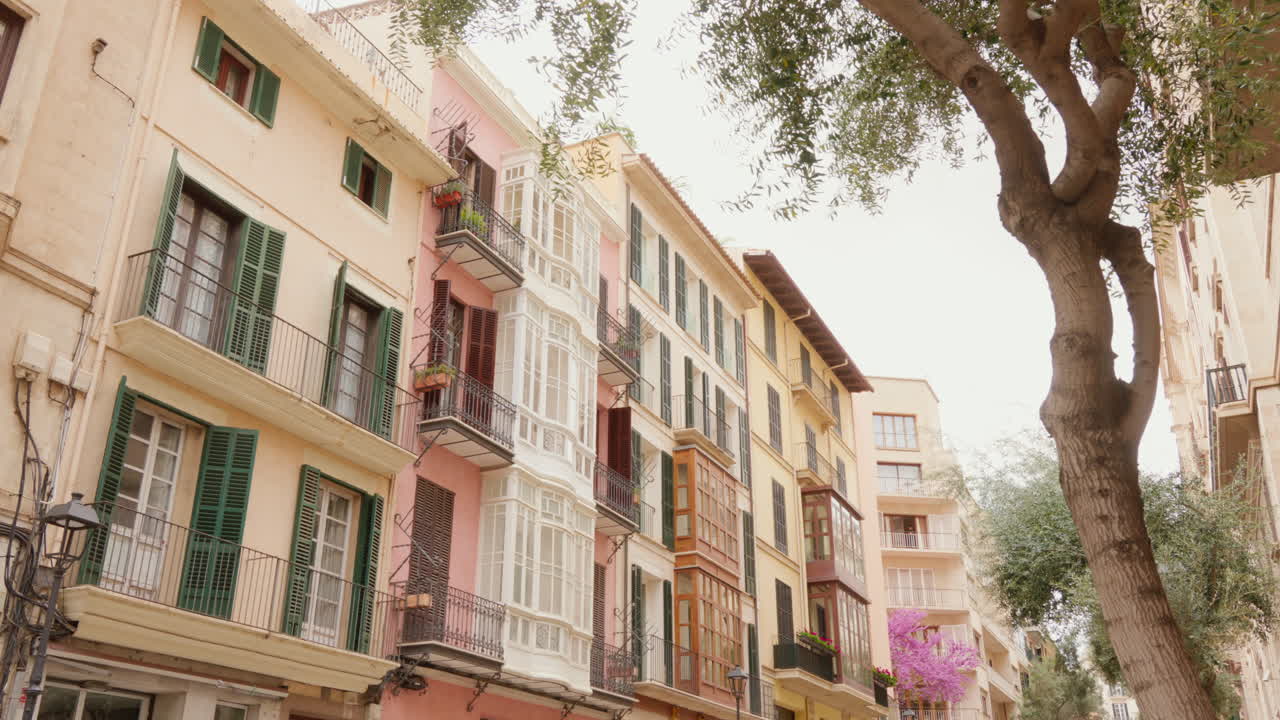 &amp;quot;The fa&ccedil;ade of typical old houses in Palma de Mallorca, showcasing the traditional architecture of the region