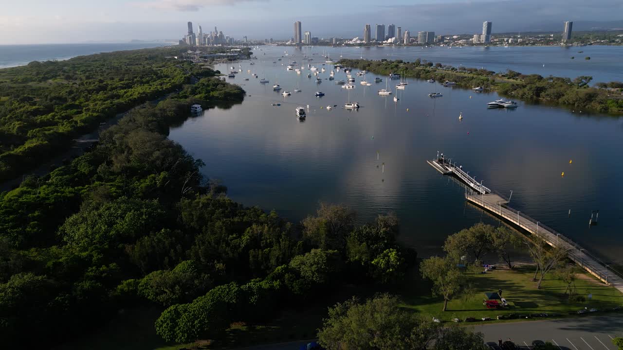 Left to right aerial view over Doug Jennings Park looking South towards Surfers Paradise, Gold Coast, Australia.