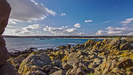 a rocky beach cloudscape time lapse - sliding