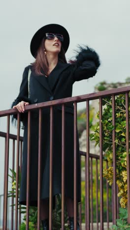 elegant woman waving happy to the people of her vintage hamlet