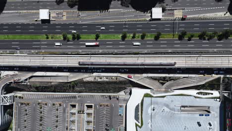 drone footage of an intercity train crossing santa fe, cdmx
