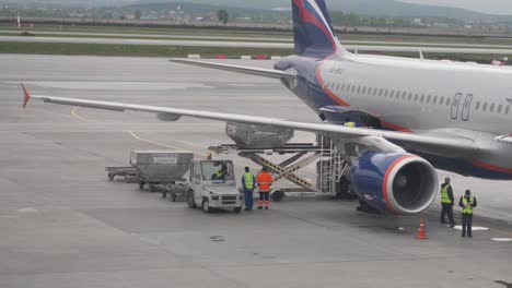 airplane loading/unloading at airport