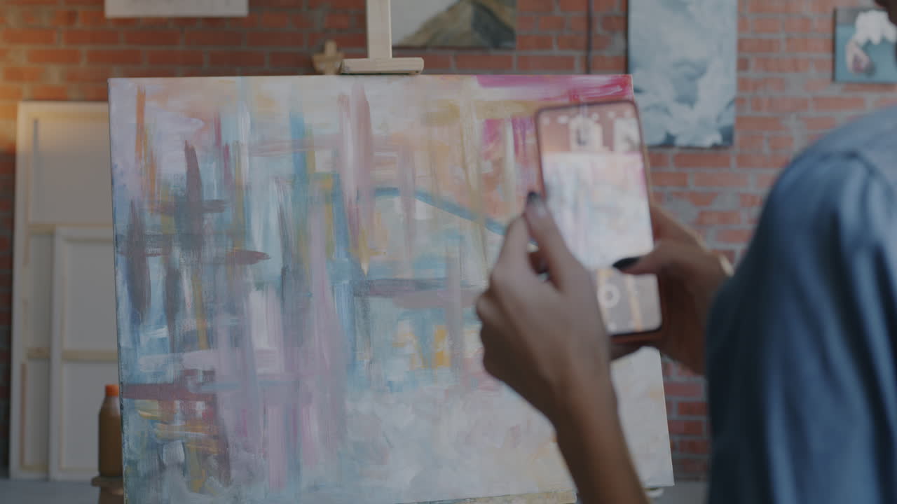 Taking a Photo of Abstract Painting in an Artist's Studio