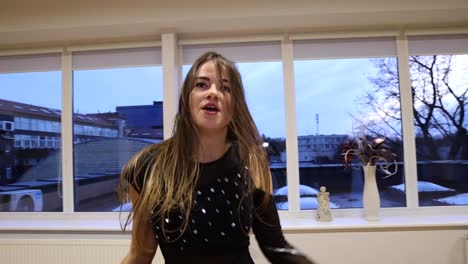 professional and passionate female dancer dances on the dance floor slow motion