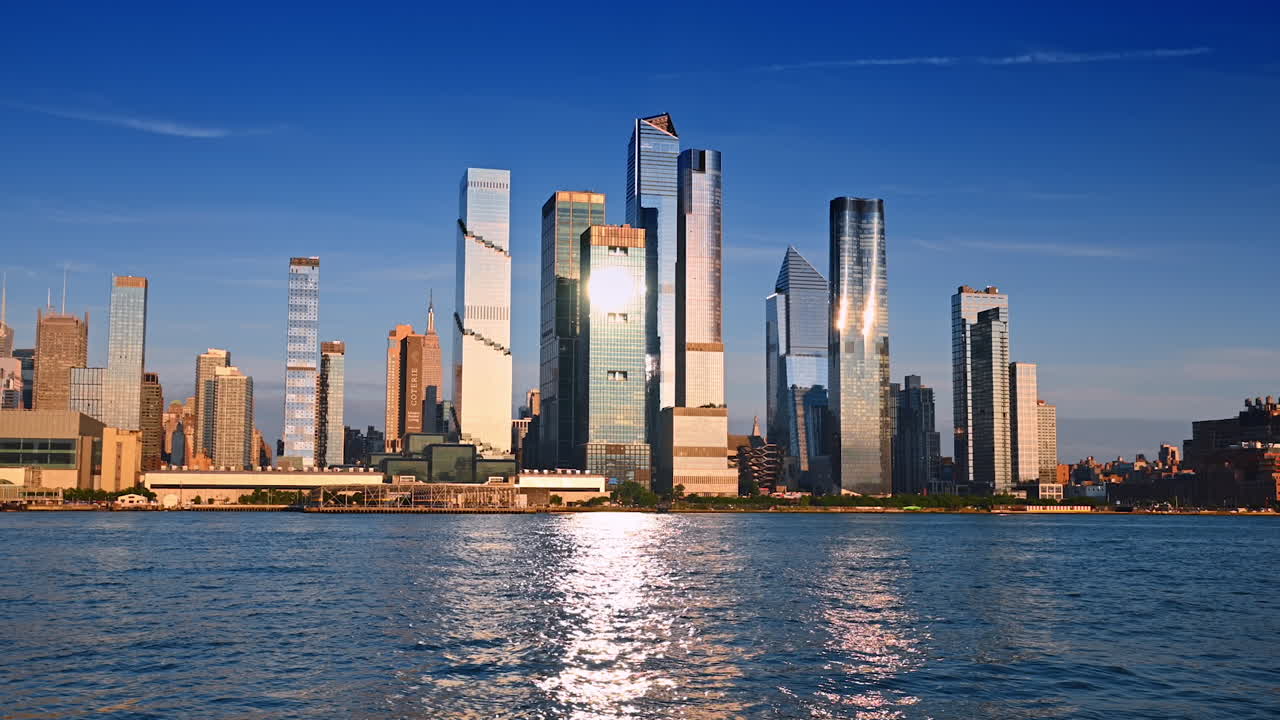 New York, USA, 4 August 2025: Panoramic view of Manhattan skyline from Hudson River. Wide panoramic view of Manhattan skyscrapers seen from the Hudson River