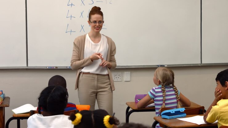 Teacher asking her pupils a question