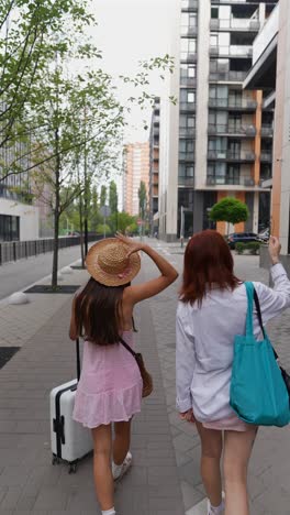 two women traveling in the city