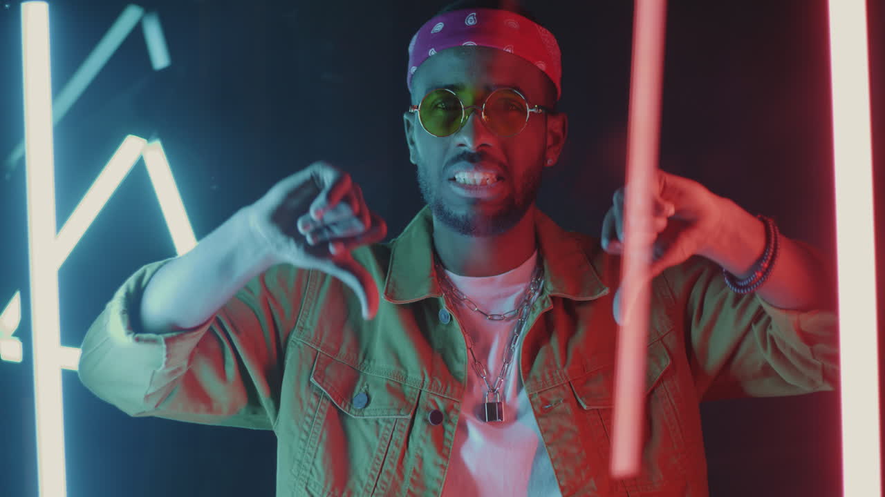 Disapproving Man in Neon Lighting