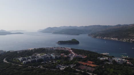 Aerial: Otočić Daksa, Croatia: azure waters, island beauty, luxury hotels