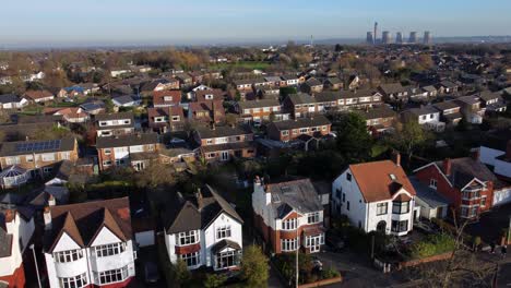 british middle class property neighbourhood aerial rising view fiddlers ferry power station skyline