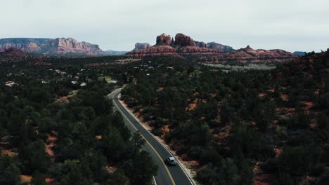 car driving through arizona's rural desert