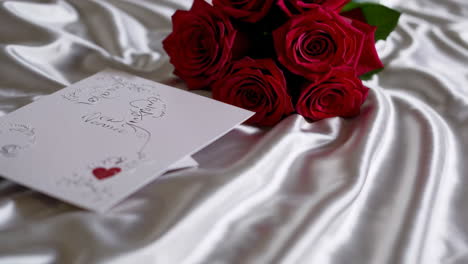 wedding invitation on white satin