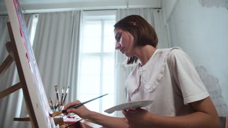 artist painting with a brush