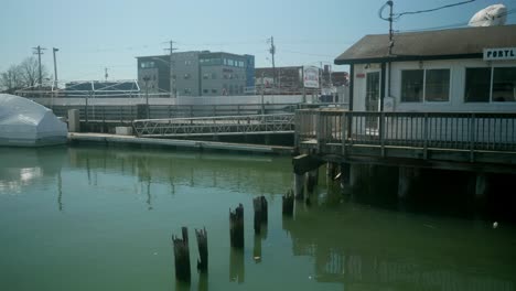 steady view of port office surrounded by water in portland, maine, usa, atmosphere and scenic waterfront location.