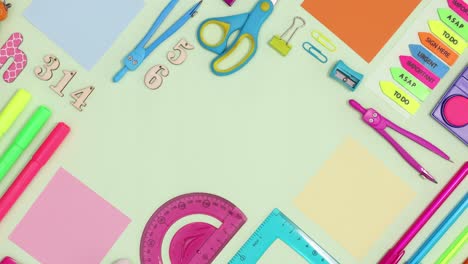 Back to school stationery ordered on green theme with copy space. Stop motion