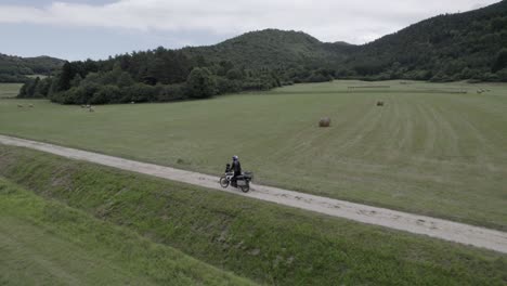 video with drone following a motorcycle off road