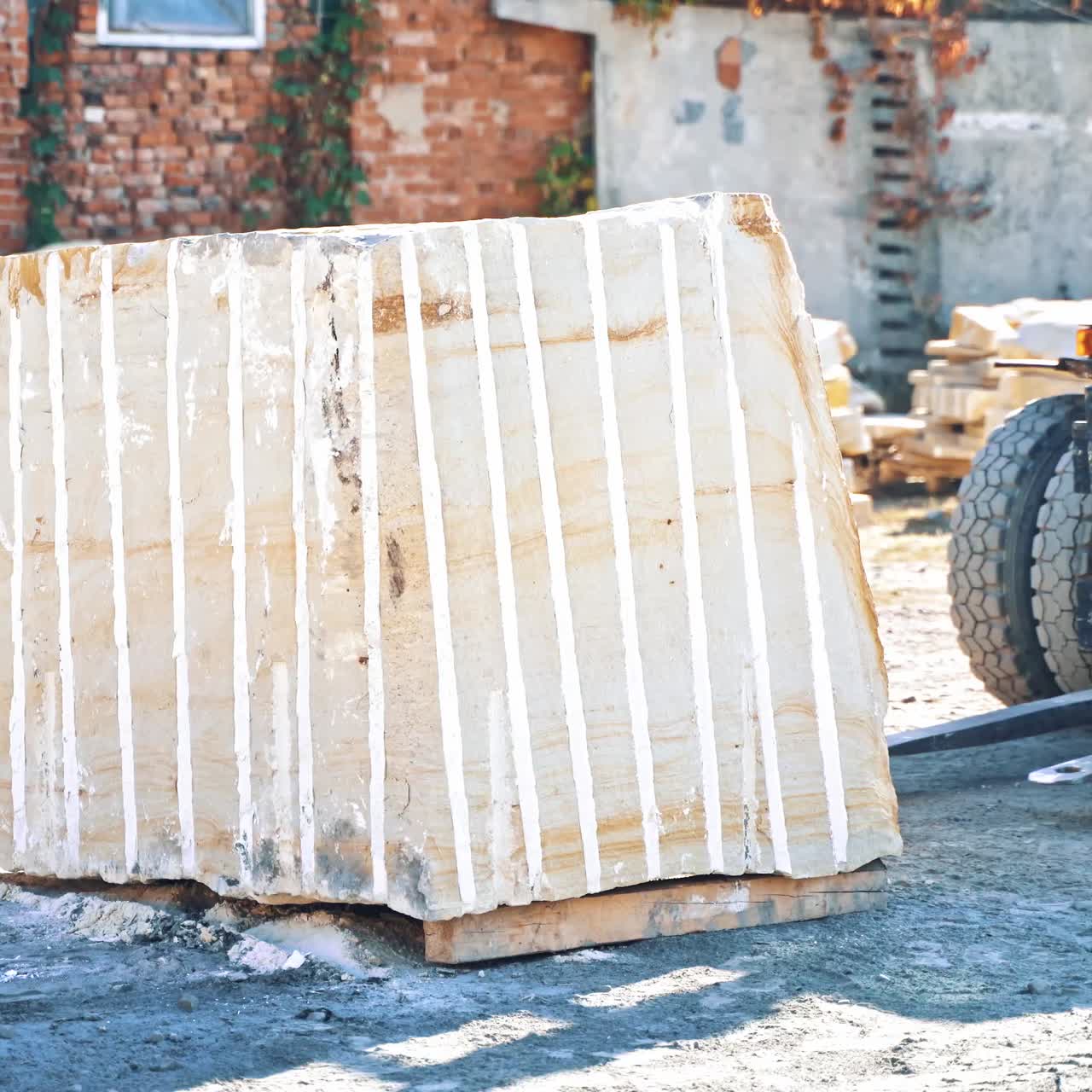Forklift truck loading marble
