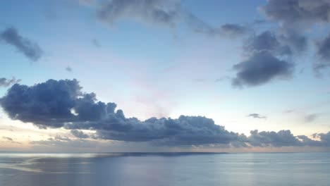 panoramic view of beautiful sunset with reflection on the water in fiji island -aerial shot