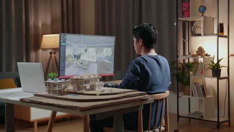 architecture student working on design project at night