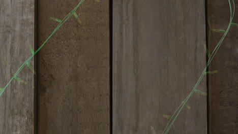 animación de luces de hadas parpadeantes con espacio de copia en fondo de madera
