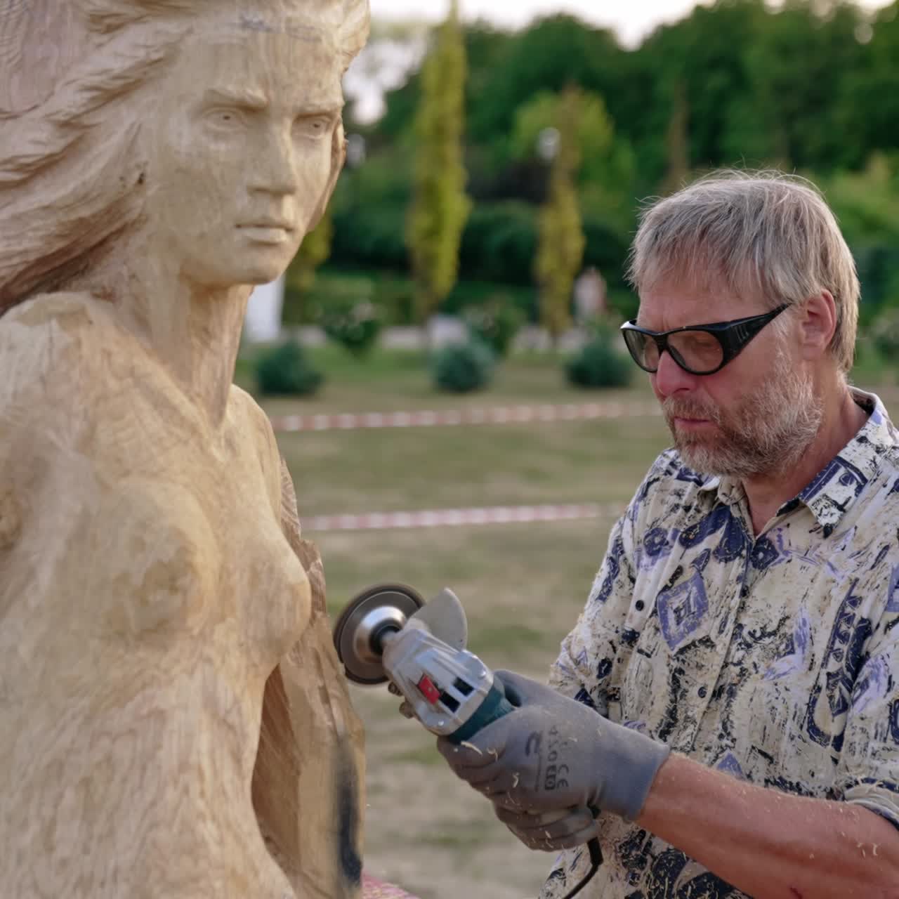 Craftsman with tool design wood decoration. Artist making wooden sculpture