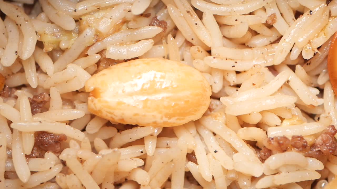 Close-up of Mixed Rice with Nuts and Ground Meat