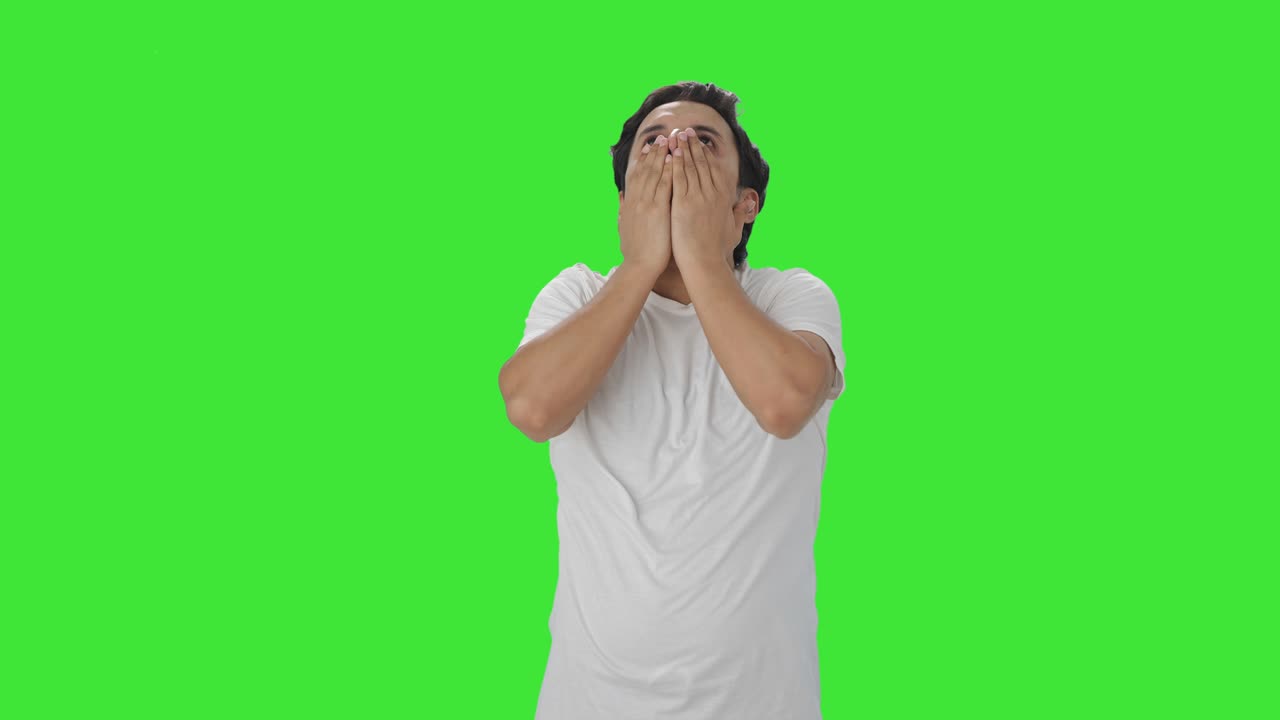 Tired and lazy Indian man yawning Green screen
