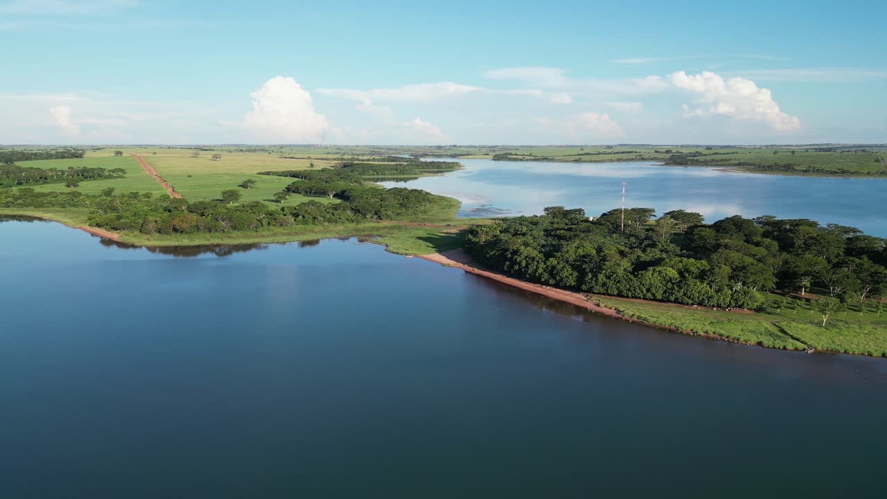 Flyover ecotourism Sun Paradise Island on Parana River reservoir Brazil